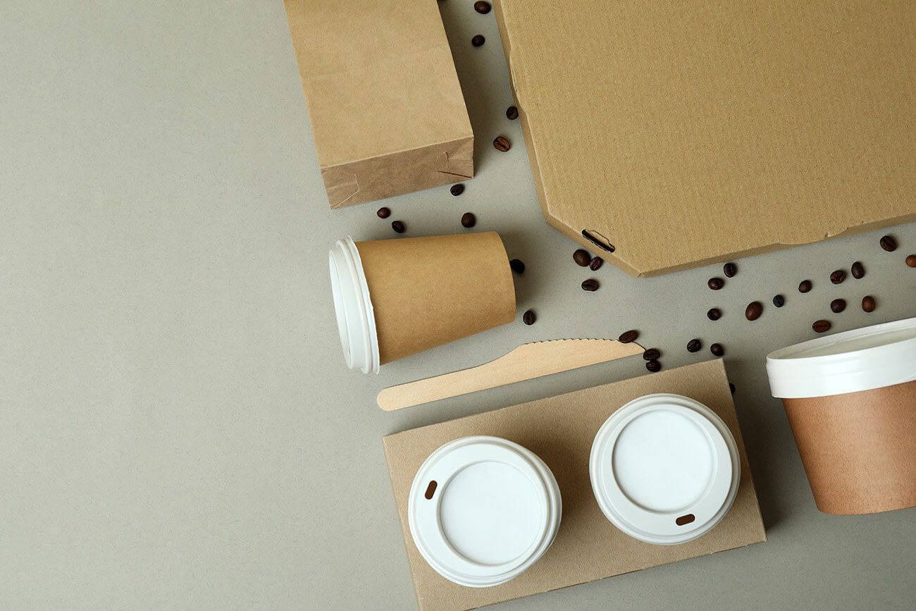 delivery-containers-for-takeaway-food-on-gray-back-2023-11-27-05-13-37-utc.jpg